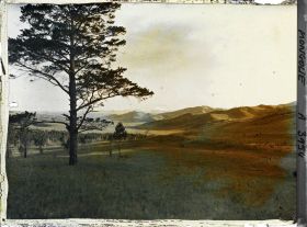 Image représentant Vue d'une vallée et de chaînes de montagne