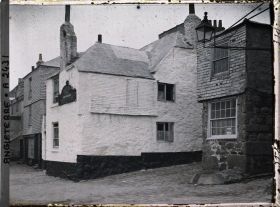 Image représentant Une rangée d'habitations